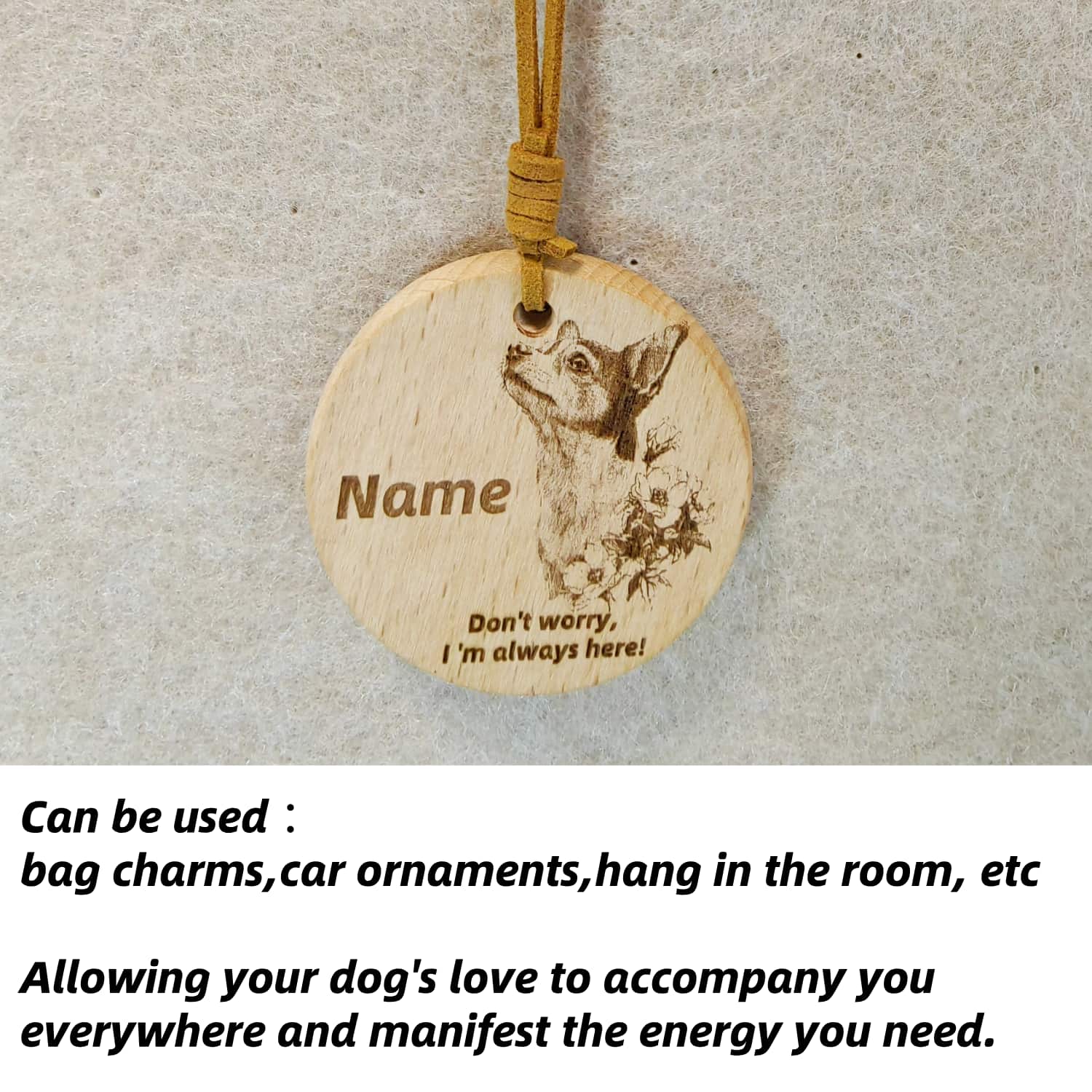 Chihuahua wooden pendant used as a [car hang/bag charm] in a lifestyle setting.