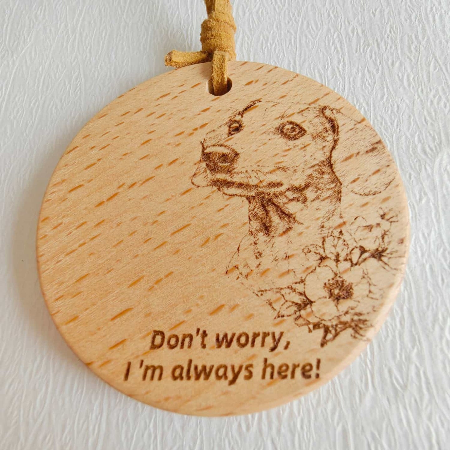  Close-up of the Dachshund love design on the wooden pendant with inspirational quote.