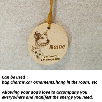  Jack Russell Terrier wooden pendant used as a [car hang/bag charm] in a lifestyle setting.