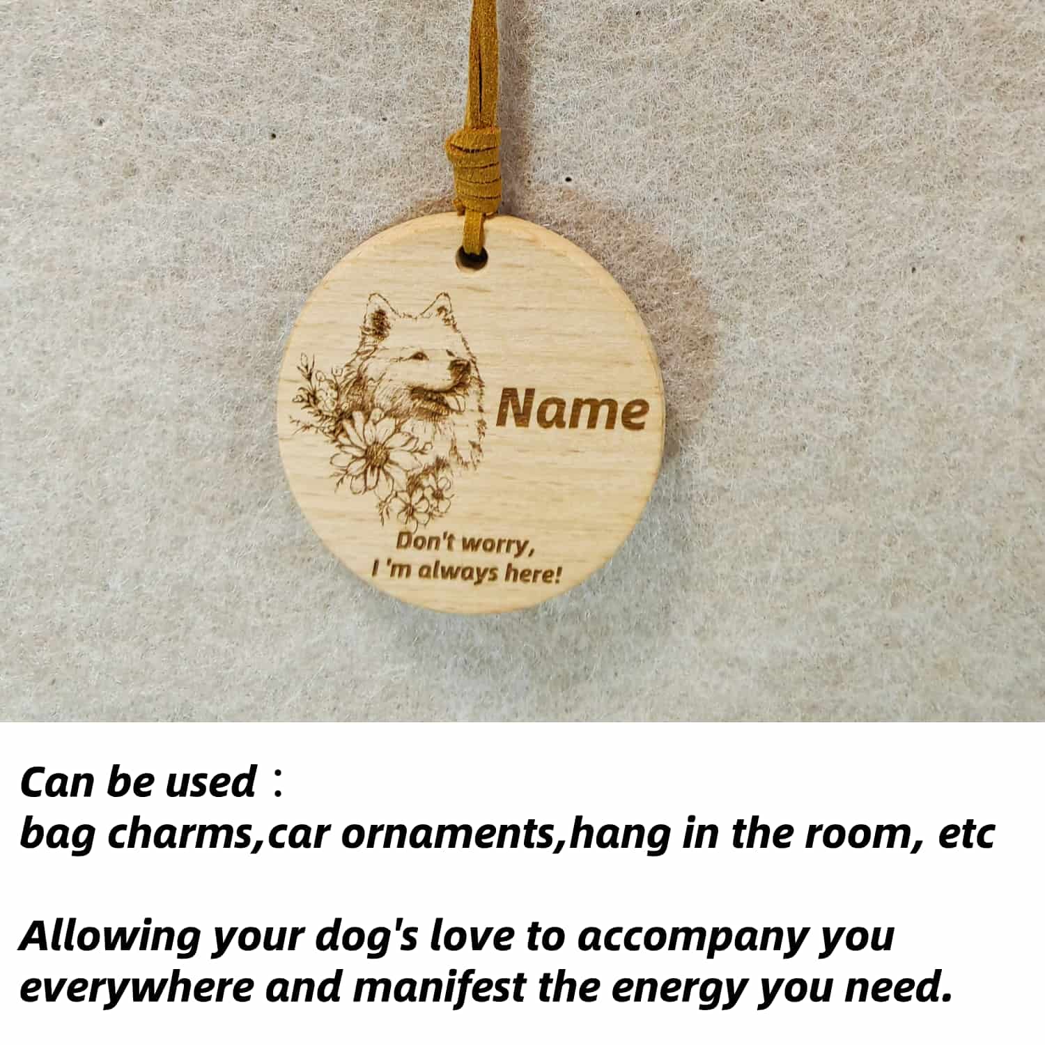 Samoyed love wooden pendant used as a [car hang/bag charm] in a lifestyle setting.